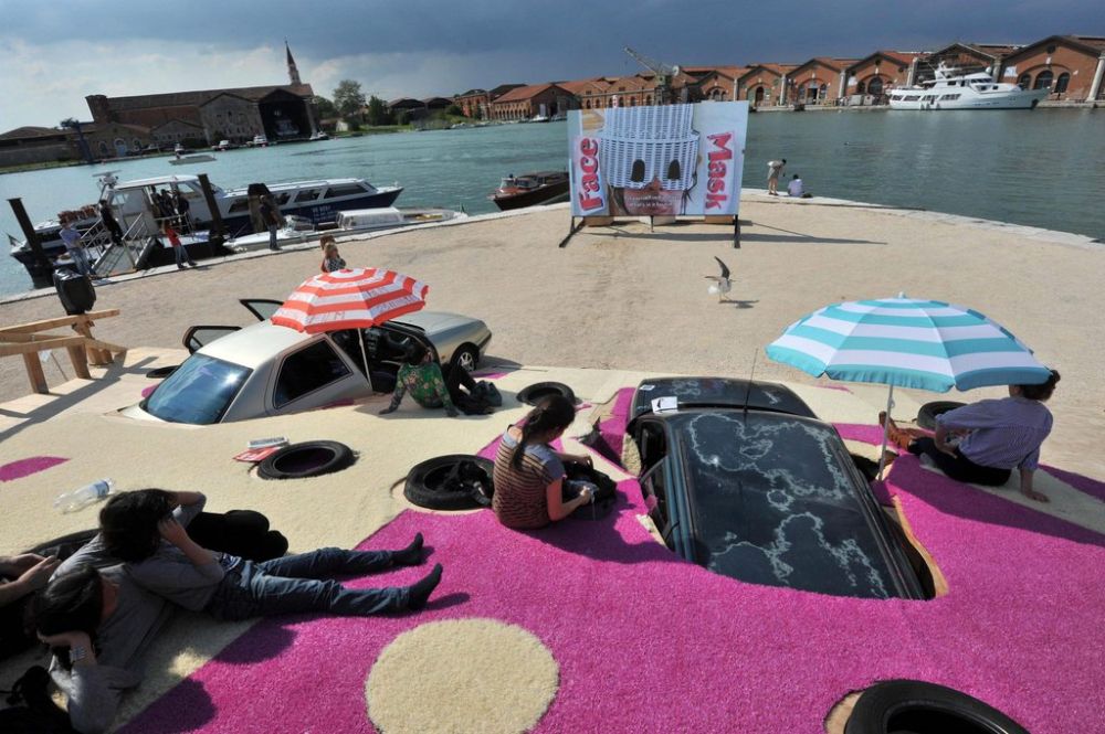 epa03723025 The artwork 'Drive In' by Dutch artist Erik van Lieshout is on display during a preview of the 55th International Art Exhibition in Venice, Italy, 29 May 2013. The Art Biennale of Venice opens to the public from 01 June to 24 November.  EPA/ANDREA MEROLA