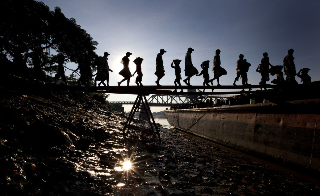 Un des buts de l'initiative est de renforcer le droit international, comme la protection des enfants, dont certains travaillent toujours, comme ici à Yangon, en Birmanie, en 2012.