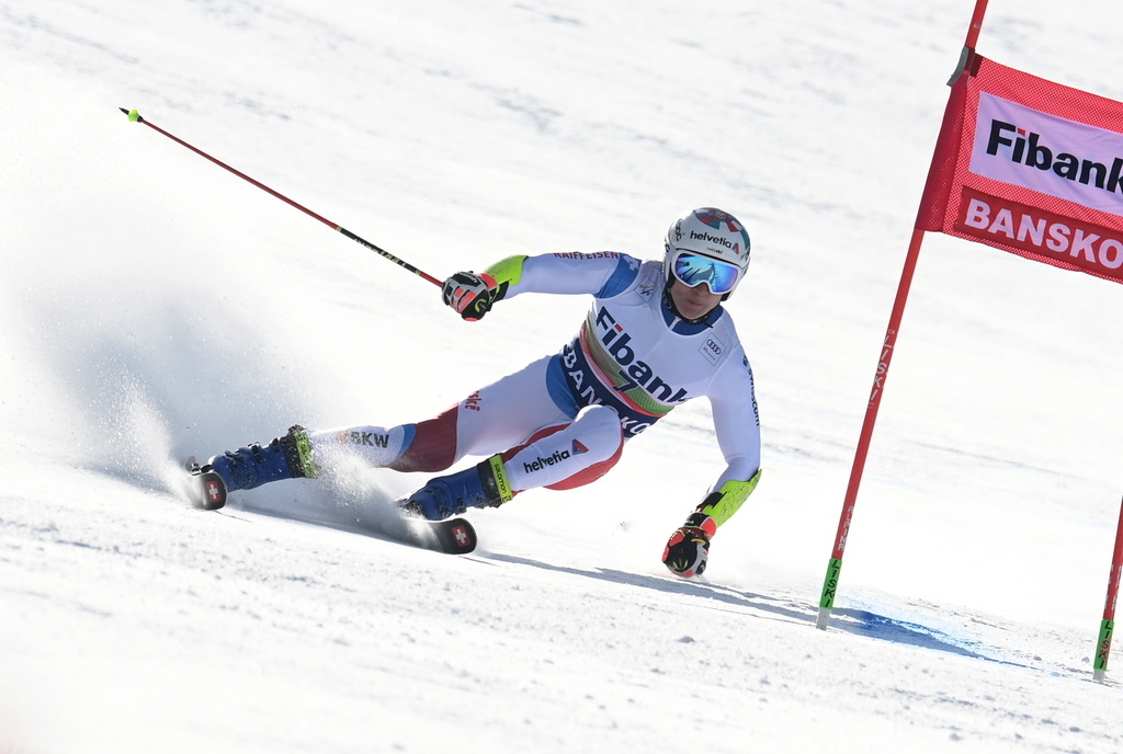 epa09041904 Marco Odermatt of Switzerland in action during the Men's Giant Slalom first run at the FIS Alpine Skiing World Cup in Bansko, Bulgaria, 28 February 2021. EPA/VASSIL DONEV