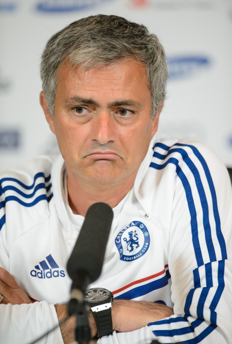 Chelsea Manager Jose Mourinho during the press conference at Chelsea FC's Training Ground at Stoke D'Abernon, England, Friday, Aug. 16, 2013. Although the league has lost one fiery manager in Alex Ferguson, who retired in May after almost 27 years at Manchester United, Jose Mourinho is back at Chelsea. Renowned for his disputes with referees during his first stint in charge of Chelsea between 2004 and 2007, Mourinho claims to be a transformed character. And with Ferguson off the scene, the league is pleased to have the charismatic and colorful Portuguese back from spells at Inter Milan and Real Madrid. (AP Photo / Dominic Lipinski/PA)  UNITED KINGDOM OUT NO SALES NO ARCHIVE