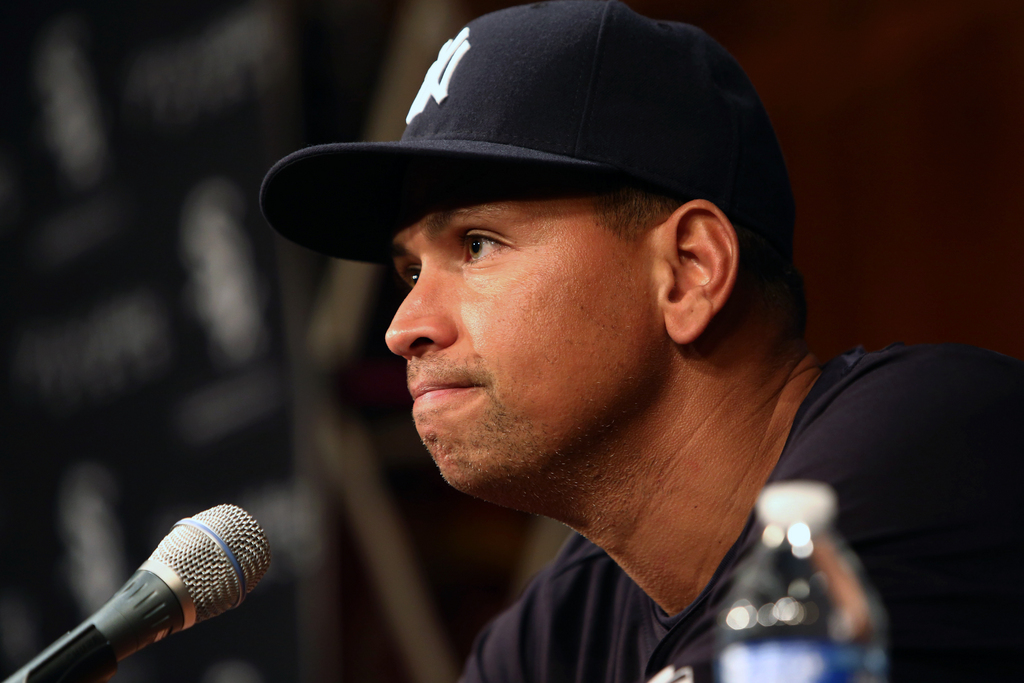 New York Yankees' Alex Rodriguez has a news conference before the Yankees play the Chicago White Sox in a baseball game, Monday, Aug. 5, 2013, in Chicago. He was suspended through 2014 and All-Stars Nelson Cruz, Jhonny Peralta and Everth Cabrera were banned 50 games apiece Monday when Major League Baseball disciplined 13 players in a drug case, the most sweeping punishment since the Black Sox scandal nearly a century ago. (AP Photo/Charles Cherney)