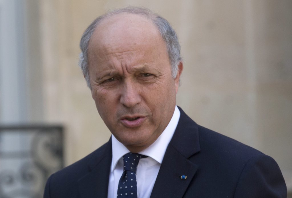 French Foreign Minister Laurent Fabius, speaks to the media after a defense meeting at the Elysee Palace in Paris, Wednesday Aug. 28, 2013. French President Francois Hollande said Tuesday, that France was prepared to take action against those responsible for gassing people in Syria.(AP Photo/Michel Euler)