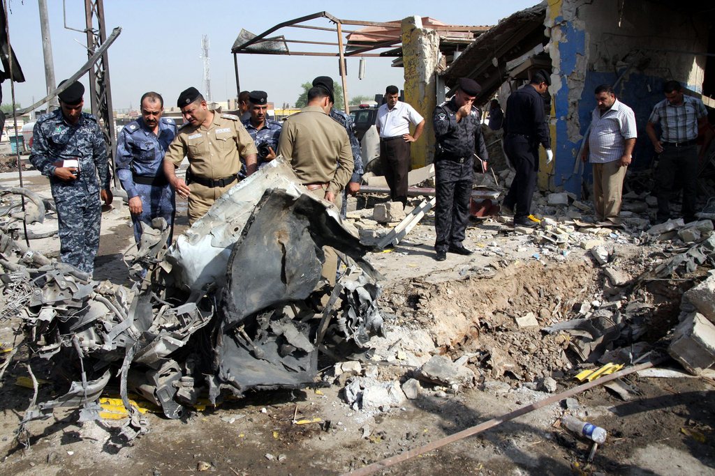 Dégâts après un attentat à la bombe à Karbala City, au sud de l'Irak. 