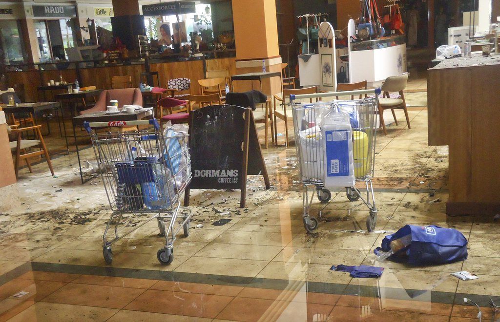 This photo taken Friday, Sept. 27, 2013 and made available Monday, Sept. 30, 2013, shows the scene at the Dormans coffee shop on the ground floor of the Westgate Mall in Nairobi, Kenya. The four-day siege, which included the collapse of part of the mall, left 67 people dead, according to officials. (AP Photo)