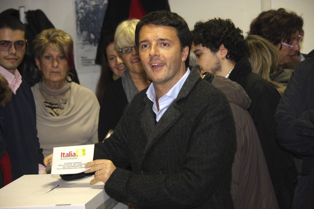 Matteo Renzi, the 37-year-old mayor of Florence, casts his vote during a primary for a center-left candidate to run in spring general elections, in Forence, Italy, Sunday, Nov. 25, 2012. Italians voted Sunday in a primary for a center-left candidate for next spring general elections that will in large part determine how Italy's tries to fix its troubled finances and emerge from a grinding recession. If none of the five candidates wins a majority, a runoff will be held next Sunday. The race is expected to come down to a faceoff between Pier Luigi Bersani, he 61-year-old leader of the main center-left Democratic Party, and challenger Matteo Renzi. (AP Photo/Matteo Bovo, Lapresse) ITALY OUT