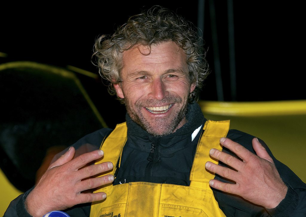 HANDOUT - Swiss skipper Bernard Stamm answers questions from journalists on board of the monohull "Cheminees Poujoulat" at the Olona Harbour after his arrival of the seventh Vendee Globe single-handed round-the-world sailing race, at the western French harbor of Les Sables d'Olonne, late Wednesday, February 6, 2013. The Swiss skipper managed to complete his circumnavigation after being disqualified for receiving outside assistance, he finished the round-the-world in 88 Days, 10 hours 27 minutes and 10 second. (CHEMINEES POUJOULAT/Thierry Martinez) *** EDITORIAL USE ONLY, NO SALES, DARF NUR MIT VOLLSTAENDIGER QUELLENANGABE VERWENDET WERDEN ***