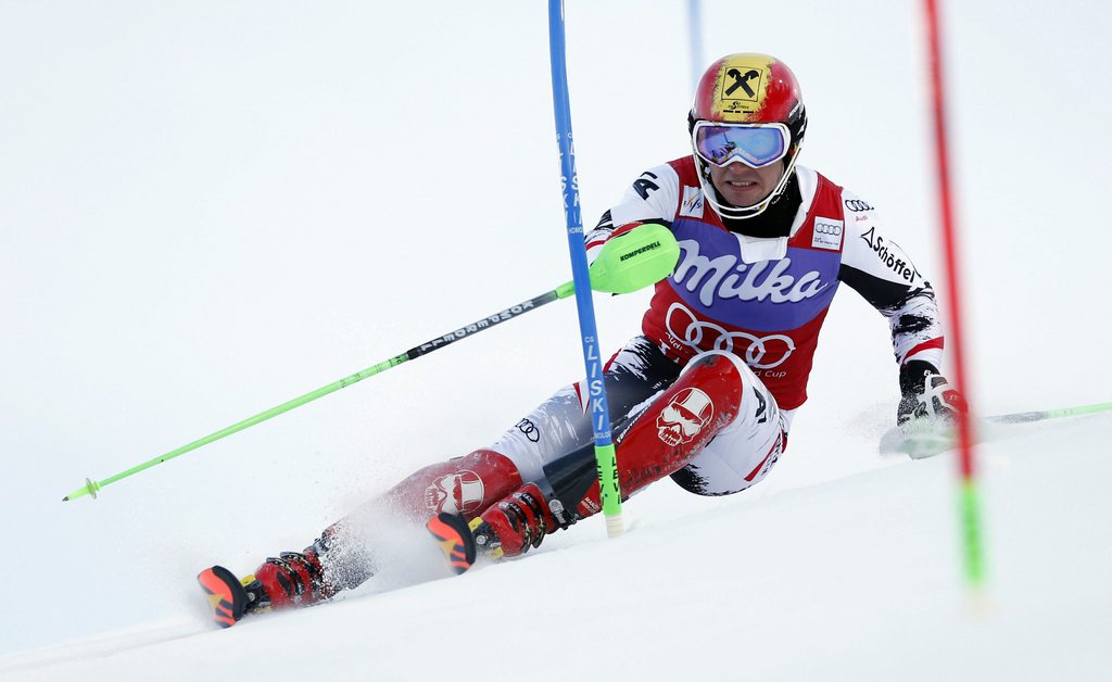 Marcel Hirscher of Austria competes during the first run of an alpine ski, men's World Cup slalom, in Levi, Finland, Sunday, Nov. 17, 2013. (AP Photo/Shin Tanaka)