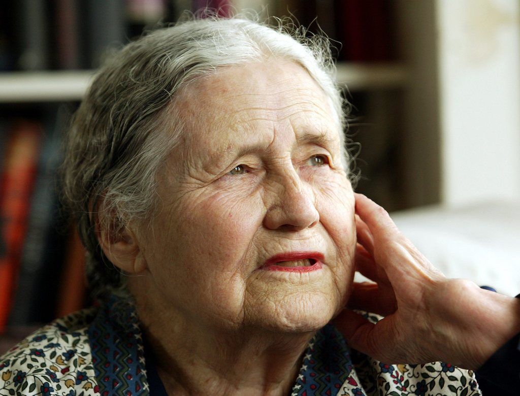 FILE - In this April 17, 2006 file photo, Writer Doris Lessing, 86, sits in her home in north London. Doris Lessing, the free-thinking, world-traveling, often-polarizing writer of "The Golden Notebook" and dozens of other novels that reflected her own improbable journey across the former British empire, has died, early Sunday, Nov. 17, 2013.  She was 94. The author of more than 50 works of fiction, nonfiction and poetry, Lessing explored topics ranging from colonial Africa to dystopian Britain, from the mystery of being female to the unknown worlds of science fiction.   (AP Photo/Martin Cleaver, File)