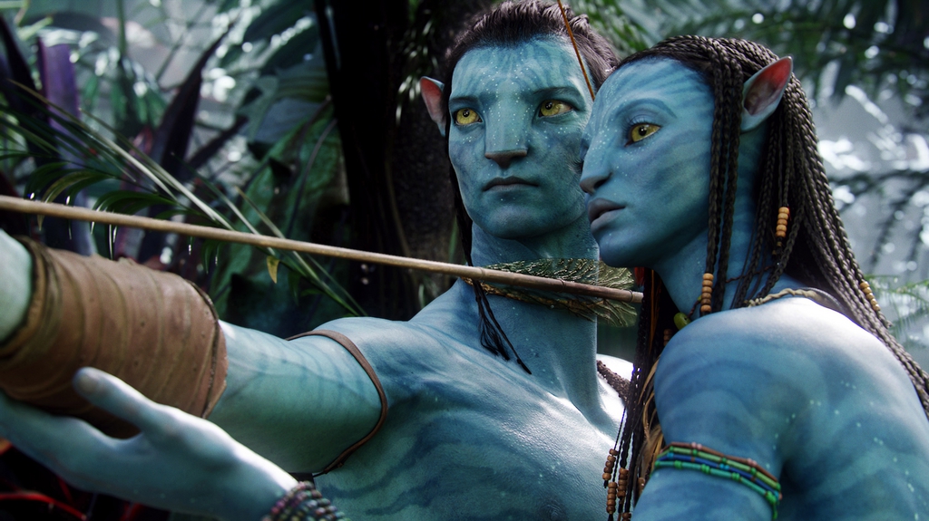 FILE - In this undated file film publicity image originally released by 20th Century Fox, the character Neytiri, voiced by Zoe Saldana, right, and the character Jake, voiced by Sam Worthington are shown in a scene from, "Avatar." Director James Cameron says he plans to make three sequels to his 2009 sci-fi blockbuster movie ?Avatar? in New Zealand.  (AP Photo/20th Century Fox, File)