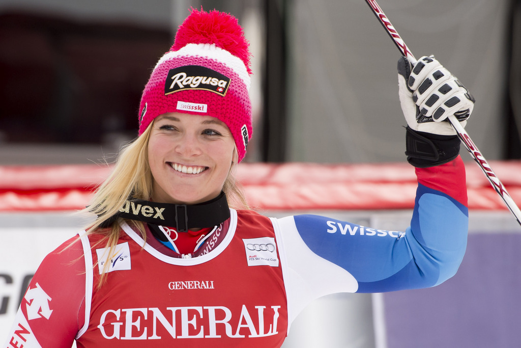 Lara Gut of Switzerland, 2nd placed, celebrates in the finish area after the second run of the women's Giant Slalom race of the FIS Alpine Ski World Cup season, in Val d'Isere, France, Sunday, December 22, 2013. (KEYSTONE/Jean-Christophe Bott)