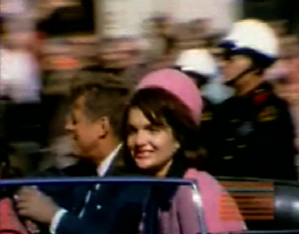 This image made from a home movie released Monday, Feb. 19, 2007 by the Sixth Floor Museum at Dealey Plaza shows former President John F. Kennedy, left, and his wife Jacqueline moments before his assassination in Dallas on Nov. 22, 1963. The recently- discovered silent, 8 mm color film made by amateur photographer George Jefferies was unveiled Monday on the museum's Web site. (AP Photo/The Sixth Floor Museum at Dealey Plaza)  ** MANDATORY CREDIT, NO SALES **