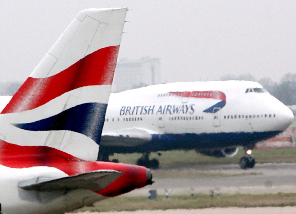 epa02418317 (FILE) A file picture dated 16 December 2007 shows a British Airways aircraft at Heathrow Airport in London, . British Airways (BA) reported, 29 October 2010, a half-year profit of 181 million euros, its first in two years, as the company prepares to merge with Iberia of Spain. The stronger-than-expected results come despite the impact of cabin crew strikes and the Icelandic ash cloud.  EPA/ANDY RAIN
