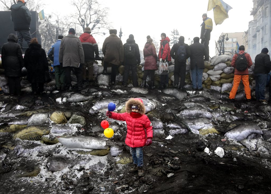 Les pressions constantes dans les rues de Kiev, mais aussi celles de l'Union européenne et des Etats-Unis, auraient-elles poussé le président ukrainien à consentir à organiser des élections anticipées?