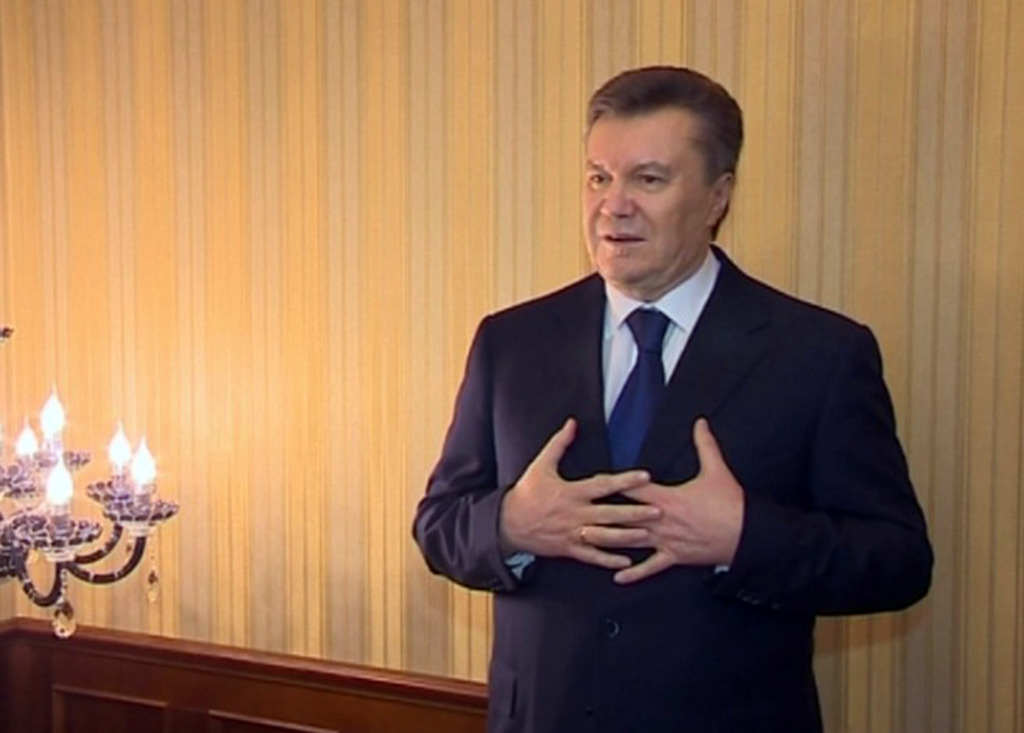 In this image made from video released by the Regional Administration of Kharkiv and distributed by AP Video, Viktor Yanukovych, President of Ukraine,  speaks in Kharkiv, Ukraine, Saturday, Feb. 22, 2014. Protesters took control of Ukraine's capital Saturday, seizing the president's office as parliament voted to remove him and hold new elections.  Yanukovych described the events as a coup and insisted he would not step down. After a tumultuous week that left scores dead and Ukraine's political destiny in flux, fears mounted that the country could split in two ? a Europe-leaning west and a Russian-leaning east and south.  (AP Photo / Regional Administration of Kharkiv)