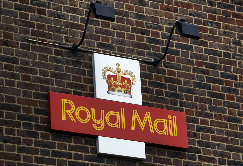 A Royal Mail Post Office is seen in London, Thursday, Oct. 10, 2013. British Business Secretary Vince Cable defended the government's sale of a majority stake in Royal Mail on Wednesday, saying that more than 700,000 retail investors have sought shares in the initial public offering. Shares are expected to be priced at between 260 pence and 330 pence, giving Royal Mail a market valuation of between 2.6 billion pounds (4.1 billion US dollars) and 3.3 billion pounds. The government would raise between 1.04 billion pounds and 1.72 billion pounds based on these figures.(AP Photo/Lefteris Pitarakis)