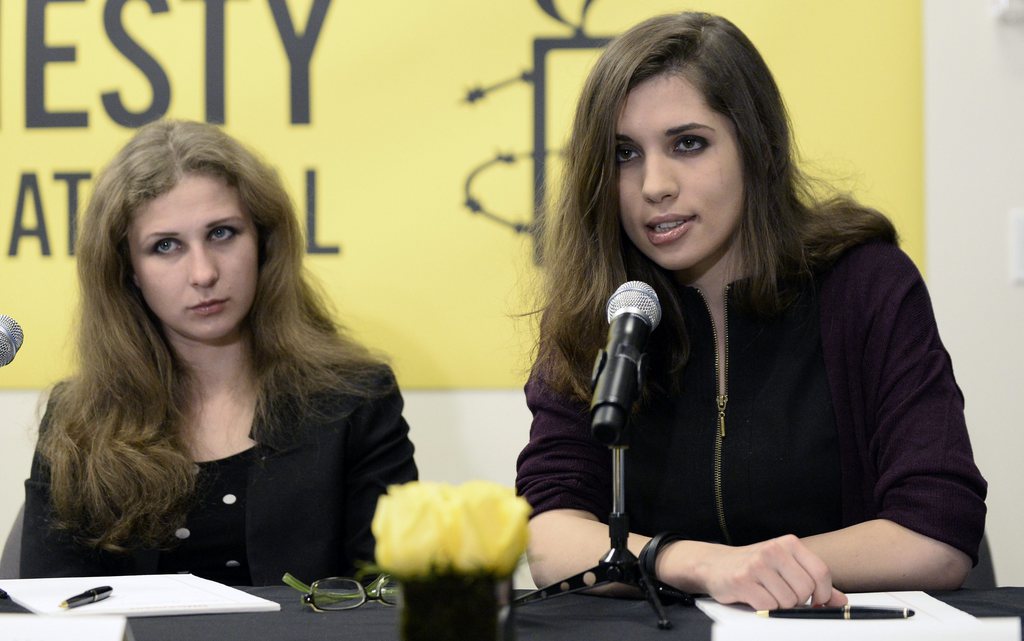 epa04085141 (FILE) A file photo dated 04 February 2014 showing Maria Alyokhina (L) and Nadezhda Tolokonnikova (R) members of the Russian feminist 'Pussy Riot' punk group members, at a press conference at Amnesty International offices in New York, New York, USA, 04 February 2014. Reports on 18 February 2014 state Pussy Riot members Nadya Tolokonnikova and Maria Alyokhina saying that they have been arrested by police in Sochi, Russia.  EPA/ANDREW GOMBERT