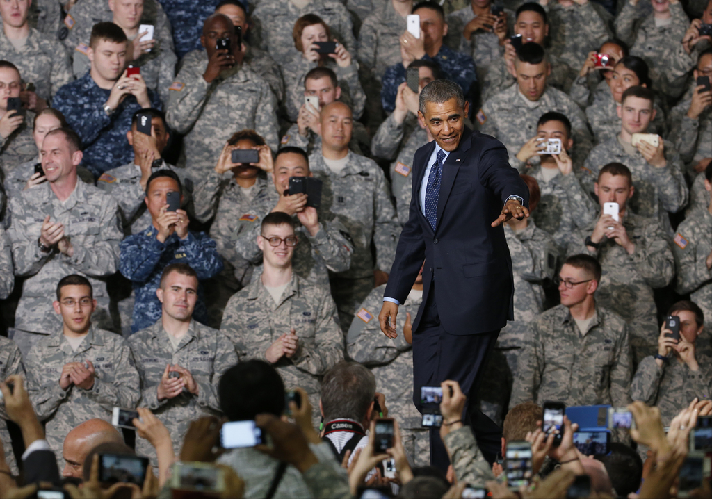 U.S. President Barack Obama arrives to address U.S. military personnel at Yongsan Army Garrison in Seoul, South Korea, Saturday, April 26, 2014. Obama is wrapping up his two-day visit to South Korea and will continue to Malaysia and the Philippines on his four country Asia visit. (AP Photo/Charles Dharapak)