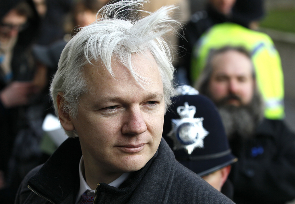 FILE - In this Feb. 1, 2012 file photo, Julian Assange, WikiLeaks founder, arrives at the Supreme Court in London. Not all journalists are created equal in the eyes of Ecuadorean President Rafael Correa. To the leftist leader, Australian-born Julian Assange is a truth-teller who deserves protection as he knocks down the walls of government secrets. Correa has even offered asylum to the founder of the website Wikileaks. Ecuadorean journalist Cesar Ricaurte, however, is another story for the 49-year-old president.. (AP Photo/Kirsty Wigglesworth, File)