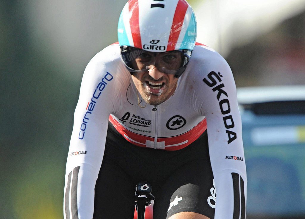 epa03883520 Bronze medalist Fabian Cancellara of Switzerland competes in the Elite men individual time trial race for the UCI Road Cycling World Championships 2013 in Florence, Italy, 25 September 2013.  EPA/MAURIZIO DEGL'INNOCENTI