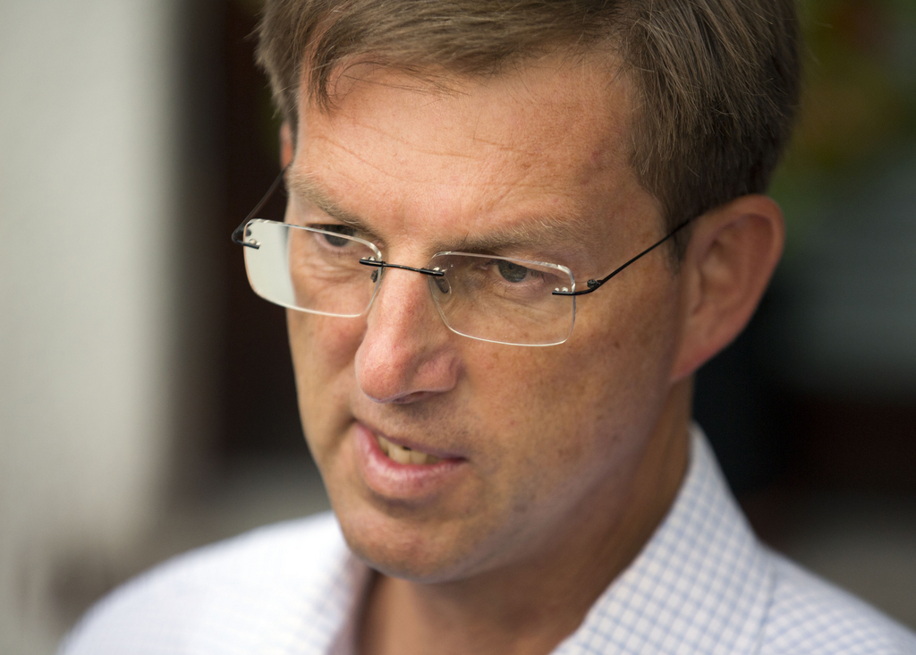 Miro Cerar, politically-inexperienced law expert and parliamentary consultant, better known as the son of Olympic medalist Miroslav Cerar, talks to the media outside a polling station in Ljubljana, Slovenia, Sunday, July 13, 2014. Slovenes are voting in the second early election in three years amid political instability that threatened the small euro zone nation's bid to pull out of an economic downturn. (AP Photo/Darko Bandic)
