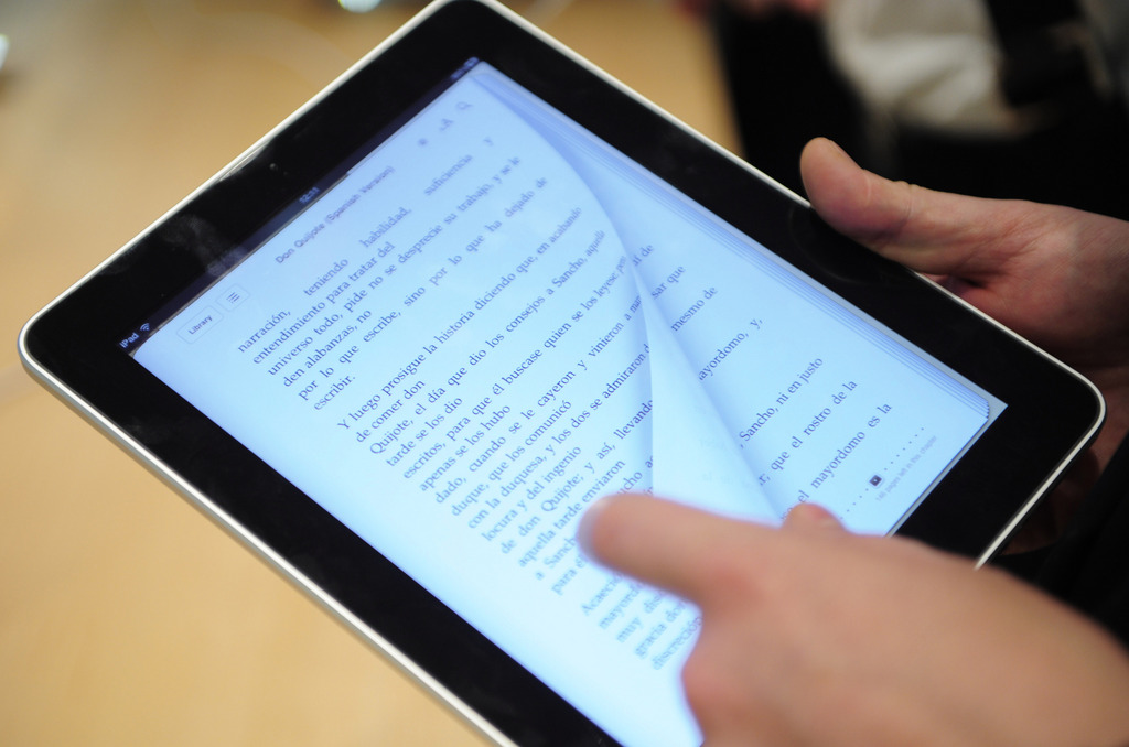 Apple a accepté de payer 450 millions de dollars dans le cadre d'un règlement à l'amiable portant sur les prix des livres électroniques.