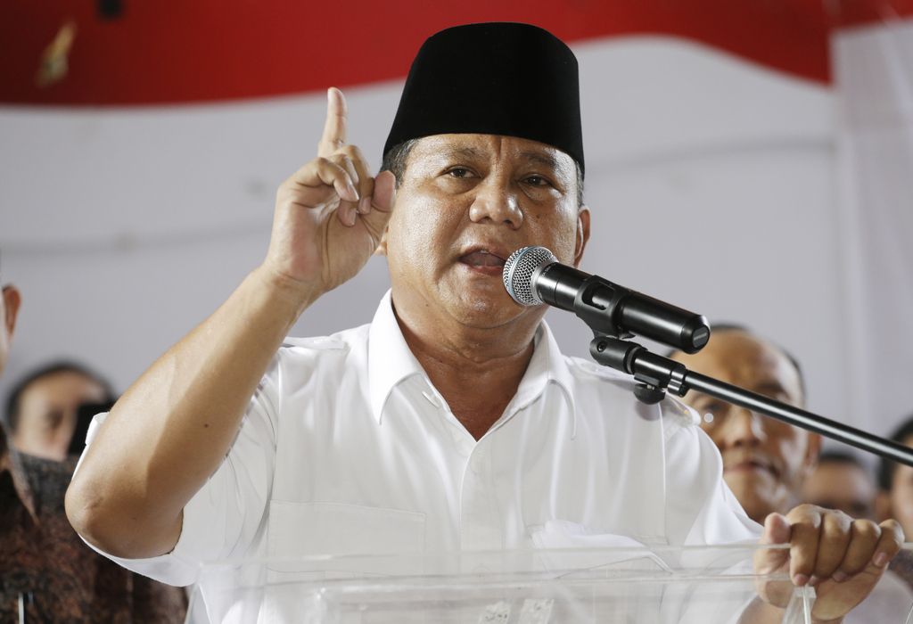 Indonesian presidential candidate Prabowo Subianto gestures during a press conference in Jakarta, Indonesia, Tuesday, July 22, 2014. Nearly complete results in Indonesia's presidential elections showed Jakarta governor Joko Widodo leading with 52 percent of the vote. (AP Photo/Achmad Ibrahim)