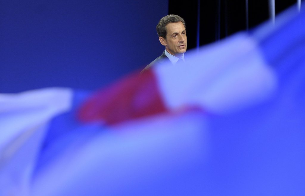 epa03169016 Nicolas Sarkozy, French President and 'Union pour un Mouvement Populaire' (UMP) party candidate for the 2012 French presidential elections, delivers a speech during a political rally, in Nancy, France, 02 April 2012. The first round of France's presidential elections will be held on 22 April 2012.  EPA/CHRISTOPHE KARABA