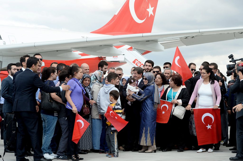 Le 20 septembre sur le tarmac d'Ankara, les otages turcs retrouvaient leur famille.