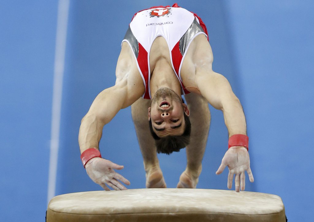 Les gymnastes suisses (ici Oliver Hegi au cheval d'arçon) a décroché le 8e et dernier ticket aux Mondiaux de gymnastique à Nanning en Chine. 