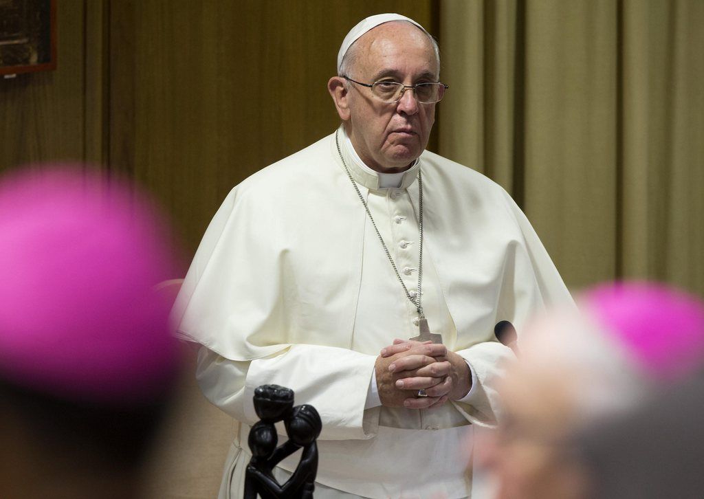 epa04434440 Pope Francis speaks on the occasion of the opening of the Extraordinary Family Synod in the Synod Hall, Vatican City, 06 October 2014. Catholic bishops were coming together for a two-week Synod in order to discuss church stances on family-related issues such as marriage, divorce, homosexuality, contraceptives and premarital sex.  EPA/CLAUDIO PERI / POOL