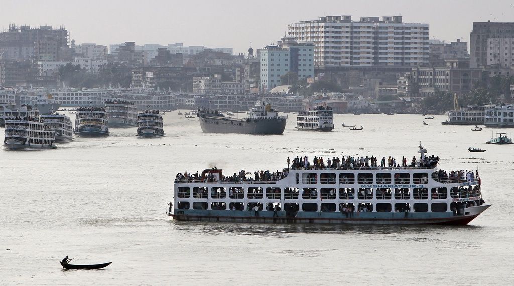 Bangladeshi Muslims travel home on ferries ahead of Eid al-Fitr in Dhaka, Bangladesh, Saturday, July 26, 2014. Eid al-Fitr marks the end of Ramadan, the Muslim calendar's holiest month, during which followers abstain from food and drink from dawn to dusk. (AP Photo/A.M. Ahad)