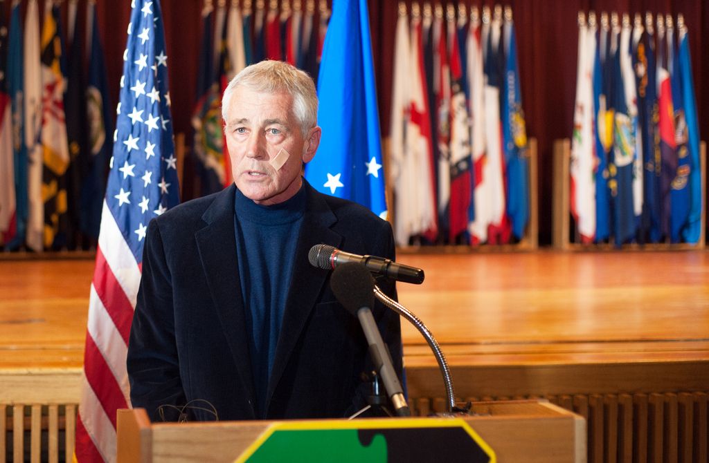 Secretary of Defense Chuck Hagel addresses the media at the Airman's Event during his visit to Minot Air Force Base, N.D., Friday, Nov. 14, 2014. The Pentagon will spend an additional $10 billion to correct deep problems of neglect and mismanagement within the nation's nuclear forces, Hagel declared Friday, pledging firm action to support the men and women who handle the world's most powerful and deadly weapons.  (AP Photo/Kevin Cederstrom)
