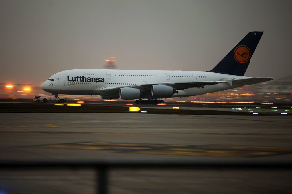 epa04511364 An Airbus A380 of German air carrier Lufthansa is pulled on the tarmac at the airport of Frankfurt, Germany, 02 December 2014. Lufthansa had to cancel about 1350 or half its scheduled flights after the German airline's pilots launched their ninth strike this year over a new retirement scheme. The airline said the nation-wide strike, which started a day earlier at noon and ends at midnight, will hit about 150,000 passengers who were scheduled to travel on the carrier's short-, medium- and long-haul flights. Cargo flights are also affected. Lufthansa wants to raise the retirement age from 55 to 60.  EPA/FREDRIK VON ERICHSEN