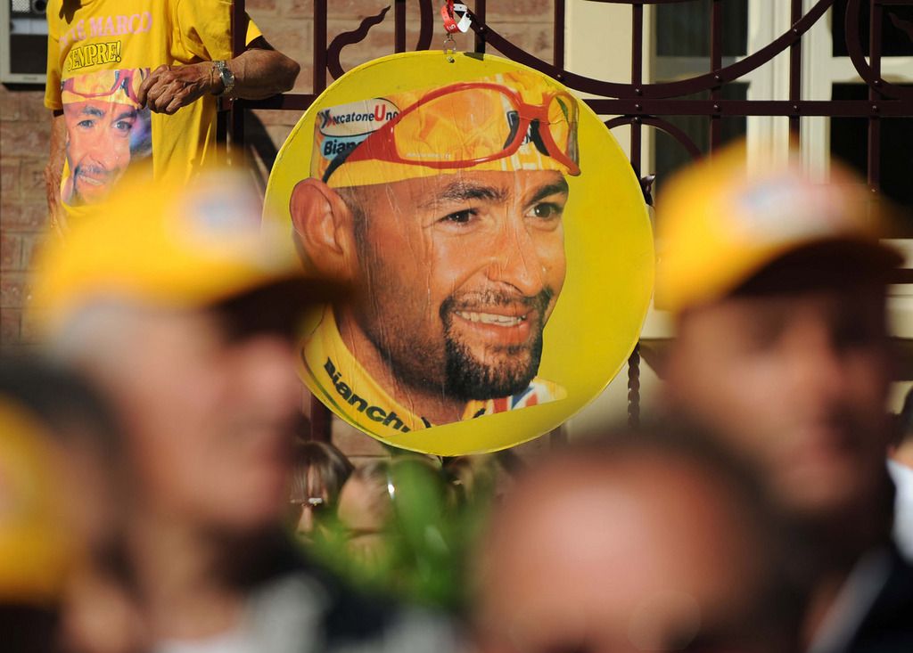 A picture of late Italian rider Marco Pantani is seen during the fifth stage of the Giro d'Italia, Tour of Italy cycling race, from Modena to Fano, Italy, Thursday, May 10, 2012. World Champion Mark Cavendish won the fifth stage of the Giro d'Italia on Thursday, but there was more bad luck for Taylor Phinney as the American was caught up in another crash on the 199-kilometer leg from Modena to Fano. (AP Photo/Fabio Ferrari)