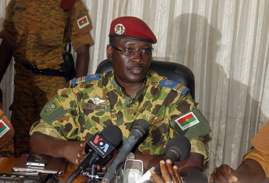 epa04472620 Colonel Isaac Zida speaks during a press conference in Ouagadougou, Burkina Faso, 01 November 2014. The second-in-command of Burkina Faso's presidential guard was 01 November chosen to rule the West African country during a transitional period after president Blaise Compaore stepped down, the radio station Omega FM reported. Army chief Honore Traore gave his backing to Isaac Zida in a statement after the two met at the army headquarters in Ouagadougou.  EPA/ETIENNE KAFANDO