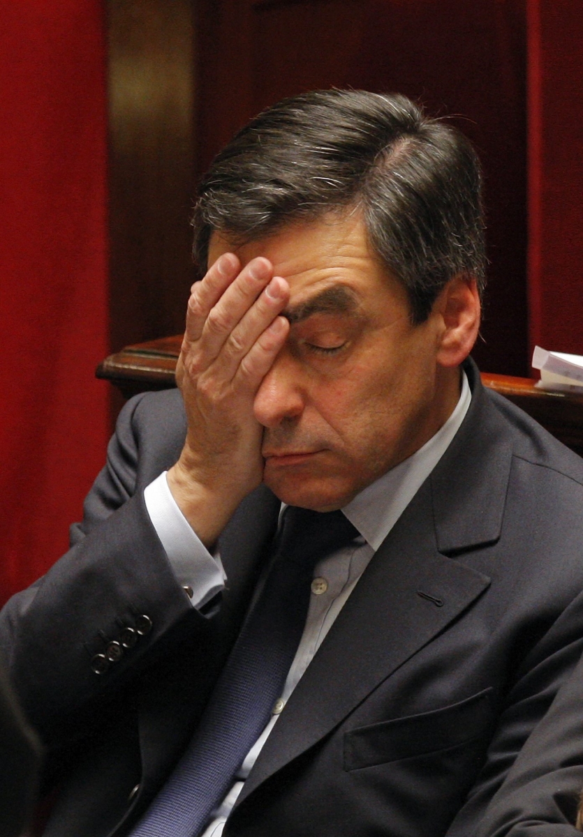 French Prime Minister Francois Fillon reacts during a debate at the French National Assembly in Paris, Tuesday, March 17, 2009. French President Nicolas Sarkozy's government faces a no-confidence vote in parliament Tuesday prompted by its plans to rejoin NATO's military command, a move that lawmakers on the left and right fear would compromise France's independence. (KEYSTONE/AP Photo/Christophe Ena)  