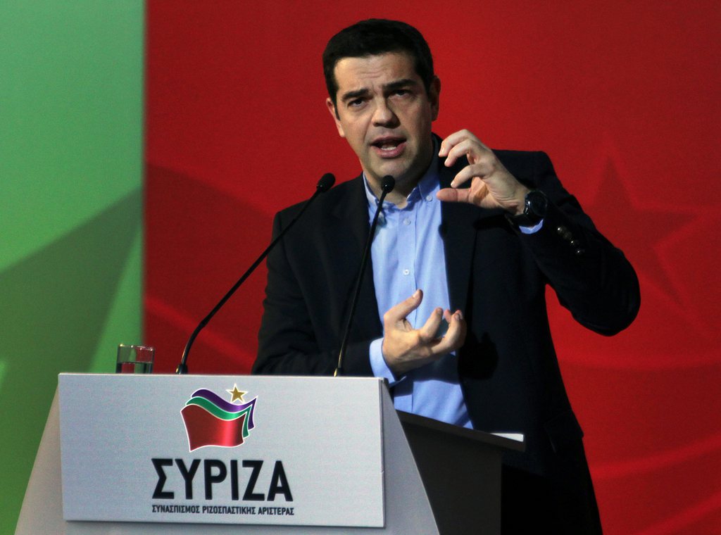 epa04642057 Prime Minister Alexis Tsipras delivers a speech during a meeting of SYRIZA's party central committee in Athens, Greece, 28 February 2015. Alexis Tsipras referred to a turbulence in the first month of SYRIZA's governance noting that Greece is not Europe's pariah any more that follows orders and only implements memorandums.  EPA/SIMELA PANTZARTZI