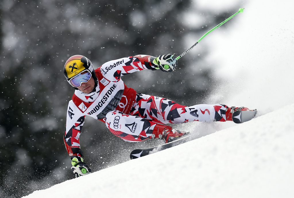 Austria's Marcel Hirscher competes during an alpine ski,  men's World Cup giant slalom, in Garmish Partenkirchen, Germany, Sunday, March 1, 2015. (AP Photo/Marco Trovati)