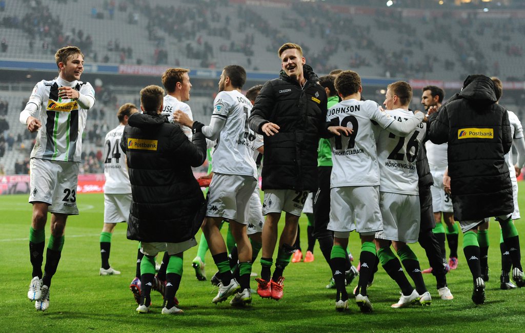 epa04675012 Moenchengladbach players celebrate the 2-0 away visctory during the German Bundesliga soccer match between FC Bayern Munich and Borussia Moenchengladbach in the Allianz Arena in Munich, Germany, 22 March 2015. ....(EMBARGO CONDITIONS - ATTENTION - Due to the accreditation guidelines, the DFL only permits the publication and utilisation of up to 15 pictures per match on the internet and in online media during the match)  EPA/Andreas Gebert  EPA/Andreas Gebert  EPA/Andreas Gebert  EPA/Andreas Gebert  EPA/Andreas Gebert  EPA/Andreas Gebert  EPA/Andreas Gebert  EPA/Andreas Gebert