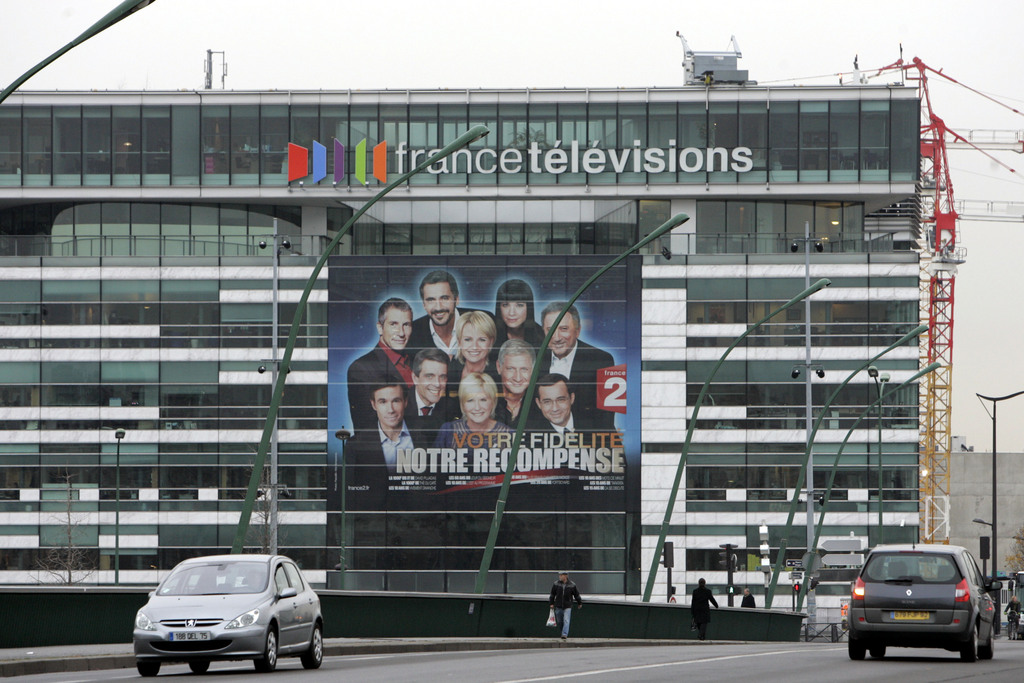 A view of public broadcasting France Televisions headquarters in Paris, Thursday Dec. 18, 2008. Early in the New Year, advertising will begin to disappear on France's public television networks, the start of a major shake-up ordered by President Nicolas Sarkozy that critics say will give him virtual control of the airwaves.  Sarkozy calls the change a "veritable cultural revolution" that will restore quality to public networks that have increasingly had to compete with the sometimes lower-brow programming of private channels.  But in addition to pulling ads from France's four public channels, the plan also allows Sarkozy to handpick the chief of public broadcasting company, France Televisions _ alarming critics who say the project sends France back decades to the days when TV was the tool of the presidency. (AP Photo/Remy de la Mauviniere)