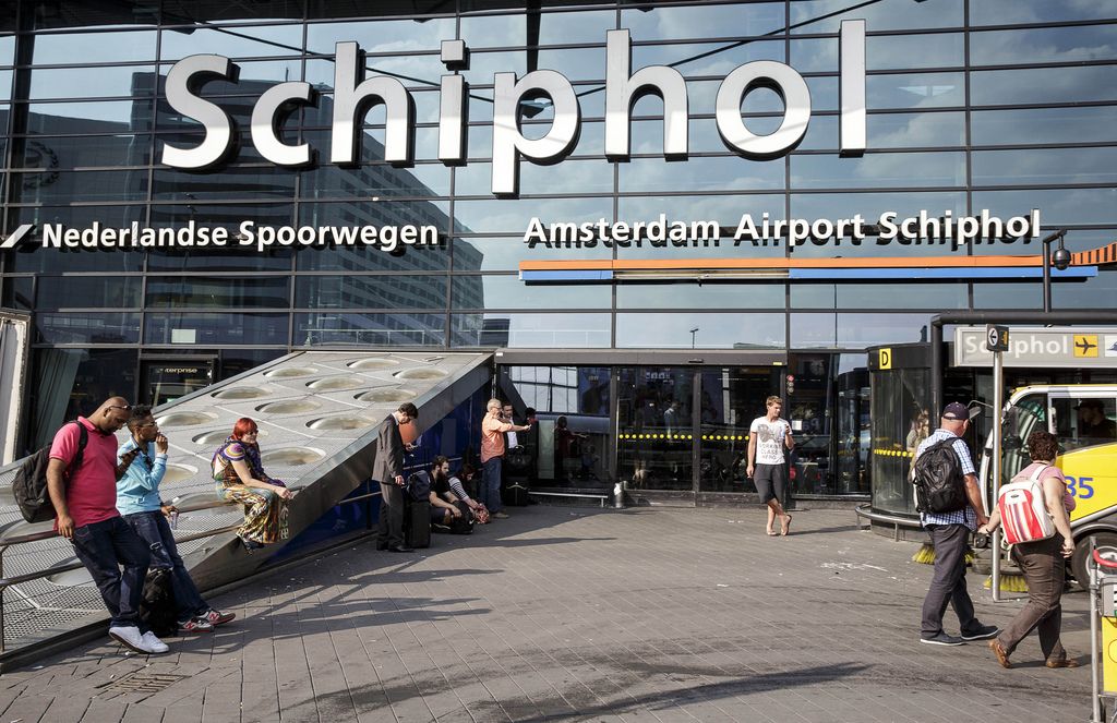 The main entrance of Schiphol airport in Amsterdam, Thursday, July 17, 2014. A Ukrainian official said a passenger plane carrying 295 people was shot down Thursday as it flew over the country and plumes of black smoke rose up near a rebel-held village in eastern Ukraine. Malaysia Airlines tweeted that it lost contact with one of its flights as it was traveling from Amsterdam to Kuala Lumpur over Ukrainian airspace. (AP Photo/Phil Nijhuis)