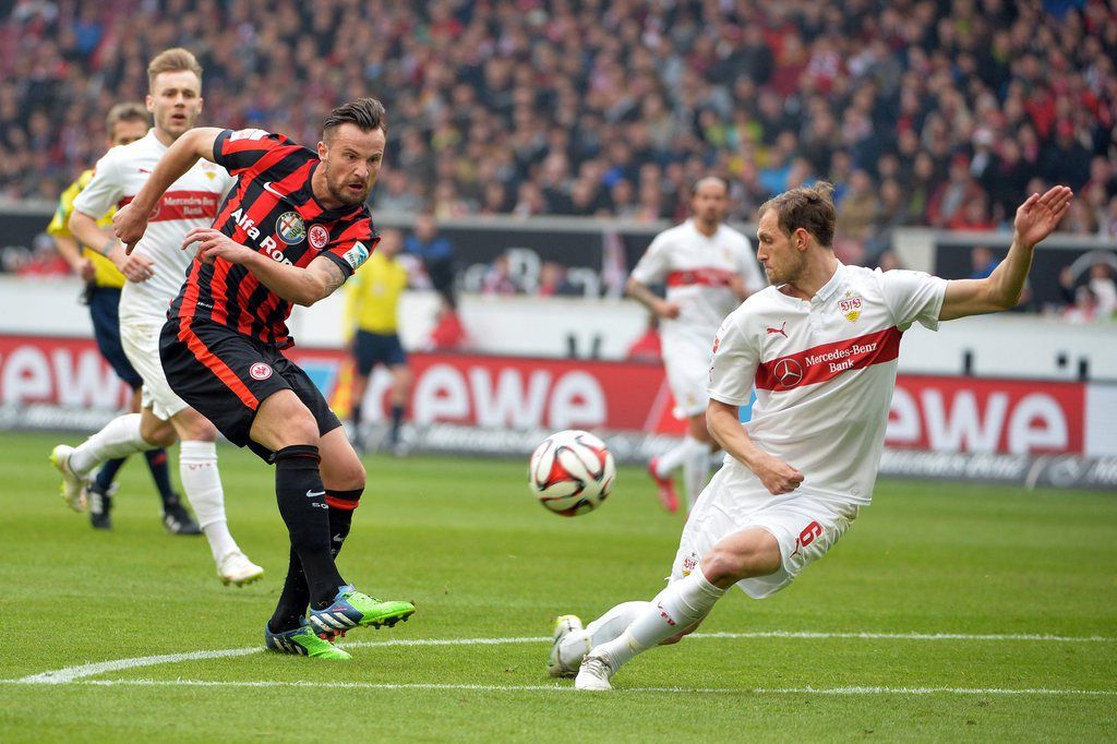 epa04673248 Stuttgart's Georg Niedermeier (R) and Frankfurt's Haris Seferovic compete for the ball during the German Bundesliga soccer match between VfB Stuttgart and Eintracht Frankfurt at Mercedes-Benz Arena in Stuttgart, Germany, 21 March 2015. ..(EMBARGO CONDITIONS - ATTENTION: Due to the accreditation guidelines, the DFL only permits the publication and utilisation of up to 15 pictures per match on the internet and in online media during the match.)  EPA/DANIEL NAUPOLD