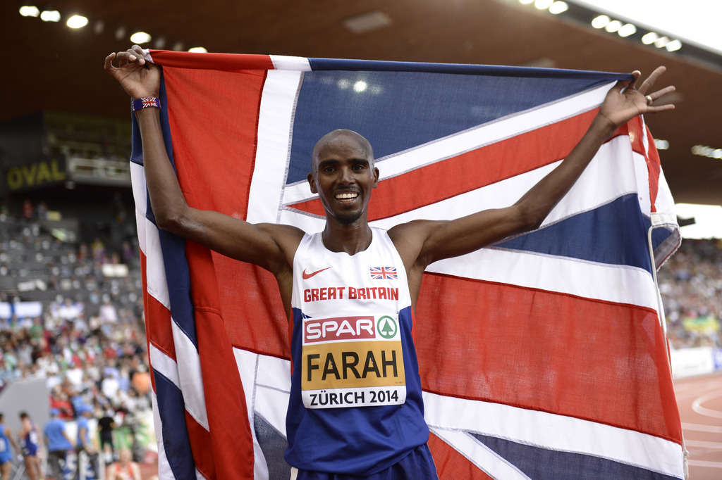 Winner Mohamed "Mo" Farah from Great Britain reacts after the men's 5'000m final, at the sixth day of the European Athletics Championships in the Letzigrund Stadium in Zurich, Switzerland, Sunday, August 17, 2014. (KEYSTONE/Jean-Christophe Bott)