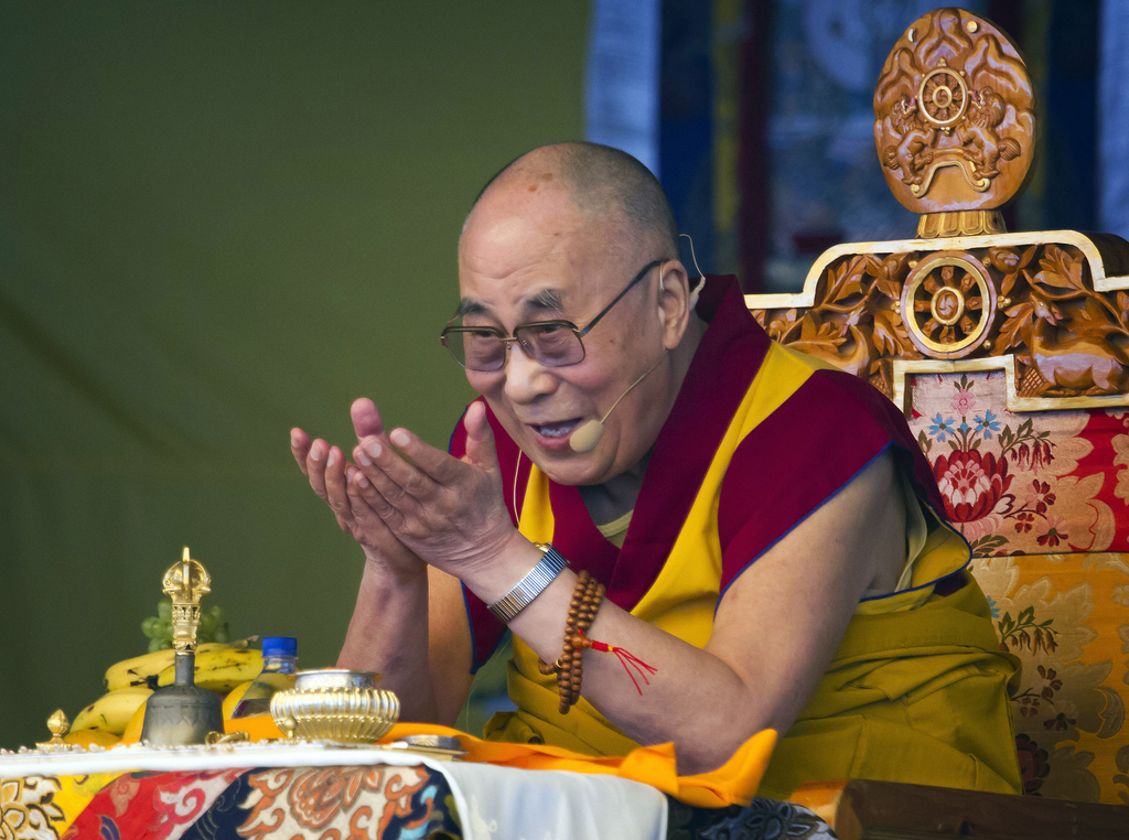 FILE - In a Friday, May 29, 2015 file photo, Tibetan spiritual leader the Dalai Lama gestures as he talks during a special ritual ceremony at the Tibetan Children's Village School in Dharmsala, India. The National Constitution Center CEO Jeffrey Rosen announced Wednesday, June 17, 2015 that the Dalai Lama will be honored with Philadelphia?s Liberty Medal for his efforts to promote compassion and human rights around the globe.  (AP Photo/Ashwini Bhatia, File)