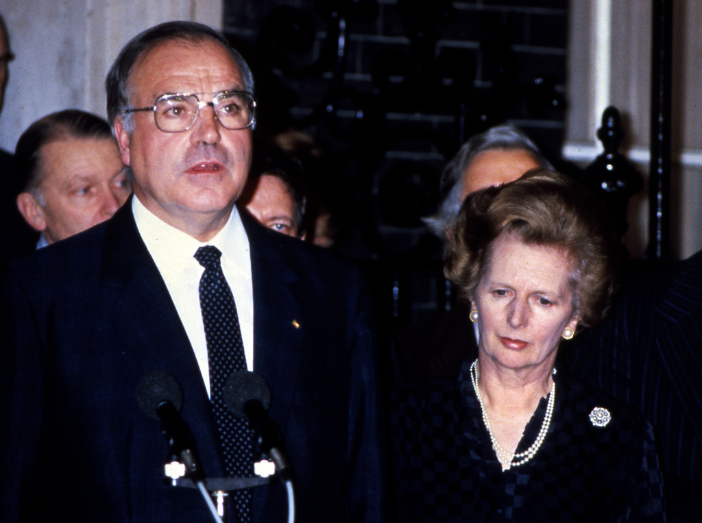British Prime Minister, Mrs. Margaret Thatcher and new West German Chancellor Herr Helmut Kohl give a press conference outside Downing Street after their meeting on Oct. 19, 1982 in London. (AP Photo)