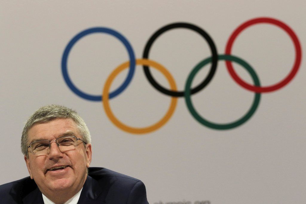 epa04870395 International Olympic Committee (IOC) President, Thomas Bach (R) speaks during a press conference at the Kuala Lumpur Convention Centre, Kuala Lumpur, Malaysia, 03 August 2105. International Olympic Committee (IOC), has elected Senegal Olympic Committee President Mamadou Diagna Ndiaye and United World Wrestling President Nenad Lalovic as new Members of the International Olympic Committee (IOC) on August 3rd.  EPA/AHMAD YUSNI