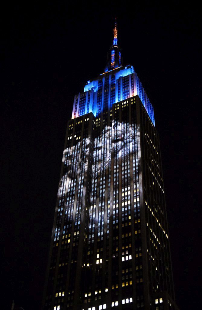 epa04869478 A projected image of an endangered species is seen on the side of the Empire State Building in New York, New York, USA, 01 August 2015. The image is part of a projected loop of images which are part of a project by film maker Travis Threlkel and Louie Psihoyos meant to draw attention to endangered species and possibly provide footage for a documentary.  EPA/JUSTIN LANE