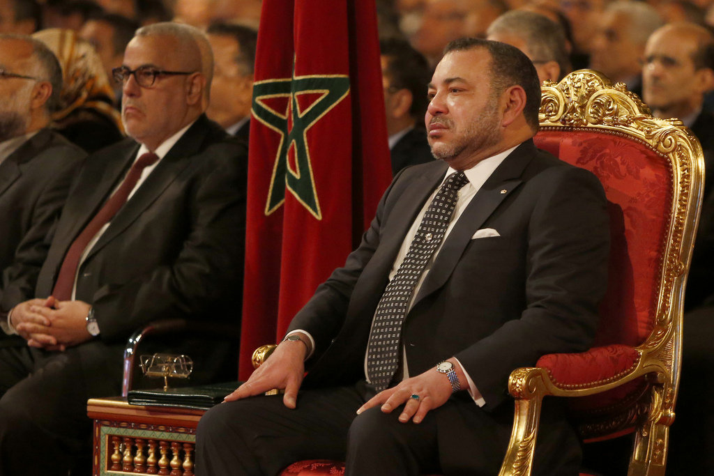 Mohammed VI, king of Morocco chairs the launch of the 2014-2020 national industrial growth plan in Casablanca, Morocco, Wednesday, April 2, 2014. At left Morocco's Prime Minister Abdelilah Benkirane. (AP Photo/Abdeljalil Bounhar)