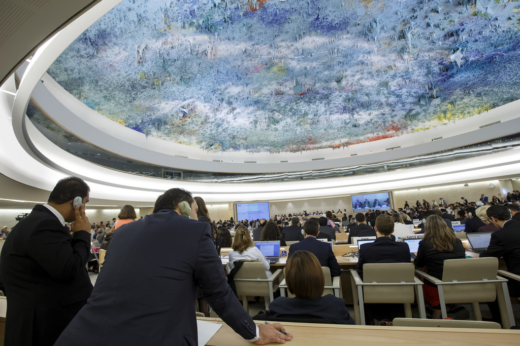 Delegates listen to a speech during the opening of the 30th session of the Human Rights Council, at the European headquarters of the United Nations in Geneva, Switzerland, Monday, September 14, 2015. (KEYSTONE/Salvatore Di Nolfi)