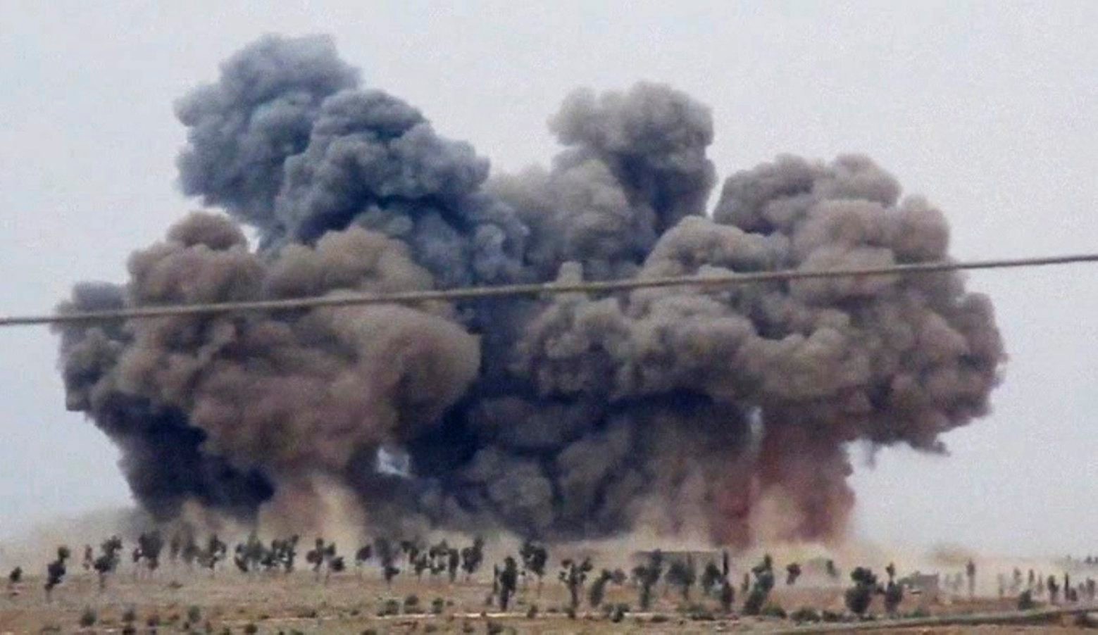In this image made from video provided by Hadi Al-Abdallah, which has been verified and is consistent with other AP reporting, smoke rises after airstrikes in Kafr Nabel of the Idlib province, western Syria, Thursday, Oct. 1, 2015. Russian jets carried out a second day of airstrikes in Syria Thursday, but there were conflicting claims about whether they were targeting Islamic State and al-Qaeda militants or trying to shore up the defenses of President Bashar Assad. (Hadi Al-Abdallah via AP) APTOPIX Mideast Syria